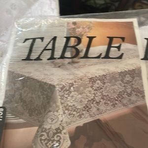 Lace tablecloth soil release permanent press size 60 X 120 100’/, polyester